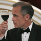 Bank of England Governor Mark Carney drinks a toast during the Bankers and Merchants Dinner at the Masion House in London.